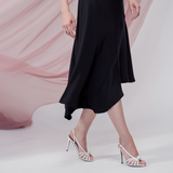 Celeste Cascade Skirt in 100% certified Como silk features an elasticated waistband and cascading hemline, offering refined elegance for day-to-night style.