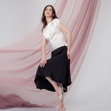 Celeste Cascade Skirt in 100% certified Como silk features an elasticated waistband and cascading hemline, offering refined elegance for day-to-night style.