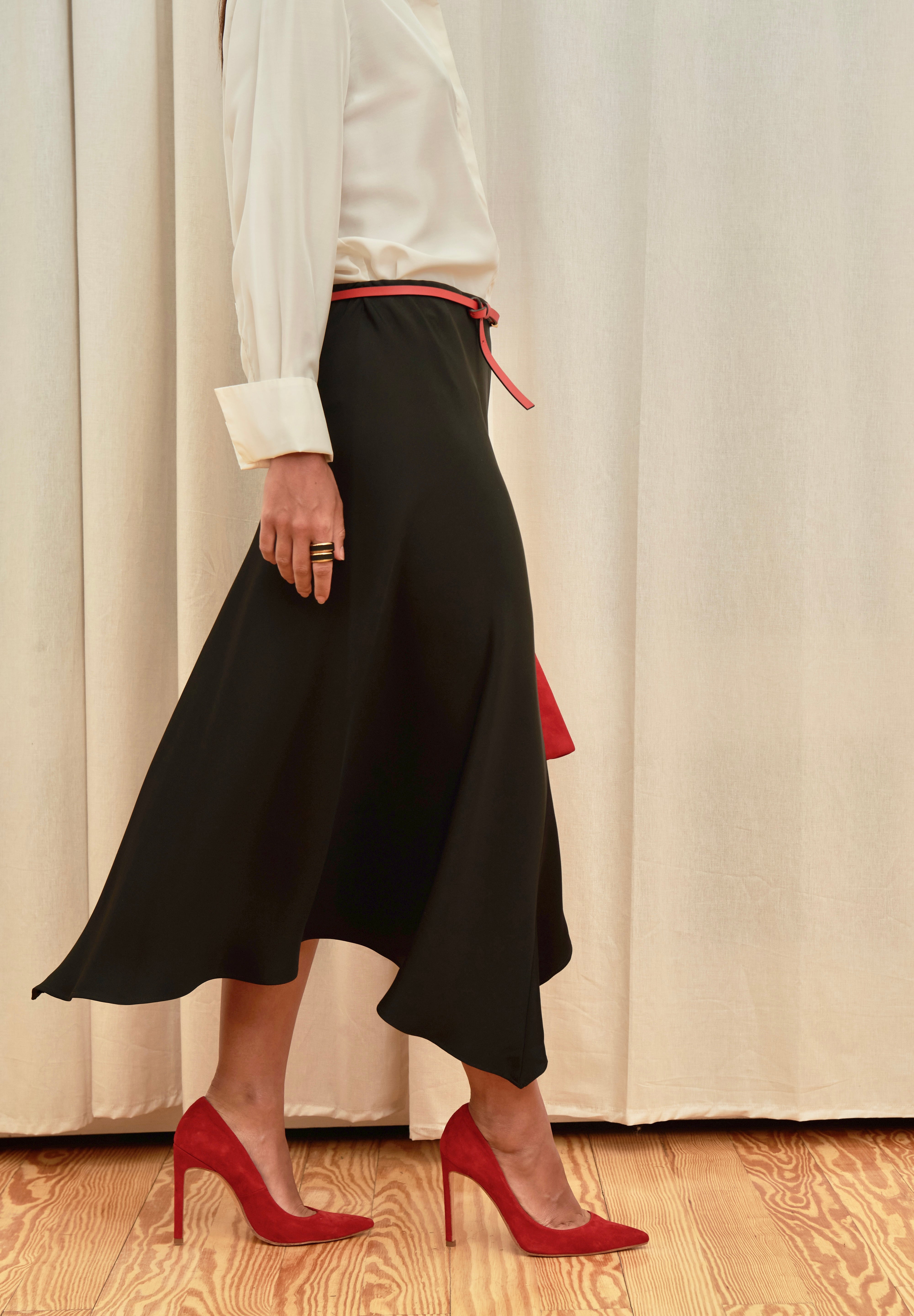 Celeste Cascade Skirt in 100% certified Como silk features an elasticated waistband and cascading hemline, offering refined elegance for day-to-night style.