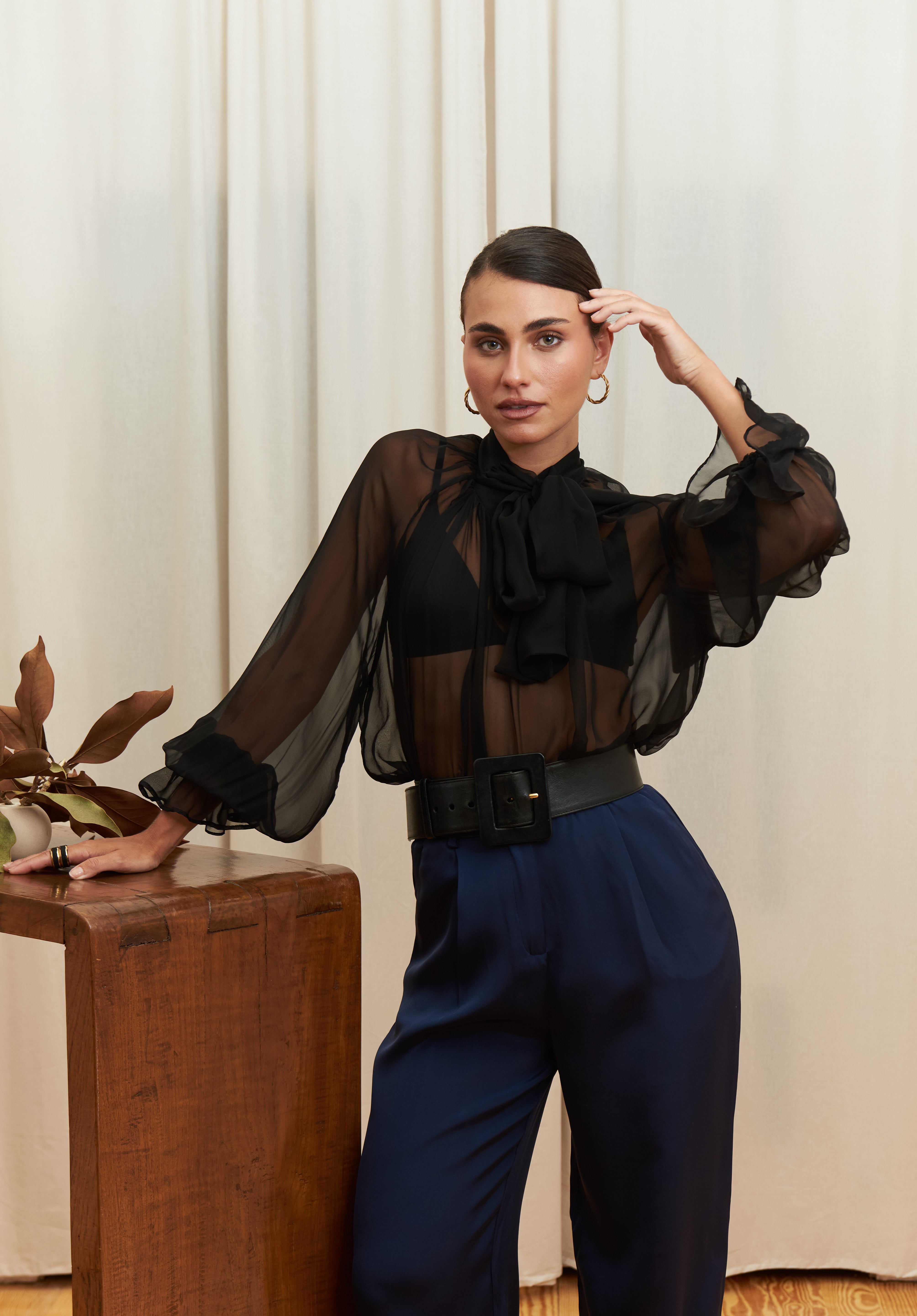 Noir Veil Blouse in 100% certified Como silk voile offers sheer elegance with voluminous sleeves and a delicate necktie—ideal for refined, modern styling.