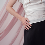 Pearl Draped Top in 100% certified Como silk offers minimalist elegance with delicate draping in white—ideal for versatile refined styling.