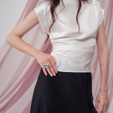 Pearl Draped Top in 100% certified Como silk offers minimalist elegance with delicate draping in white—ideal for versatile refined styling.