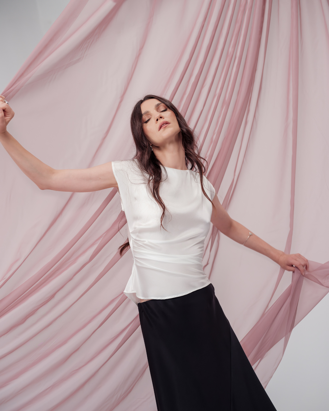 Pearl Draped Top in 100% certified Como silk offers minimalist elegance with delicate draping in white—ideal for versatile refined styling.