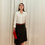 Celeste Cascade Skirt in 100% certified Como silk features an elasticated waistband and cascading hemline, offering refined elegance for day-to-night style.