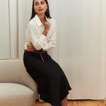 Celeste Cascade Skirt in 100% certified Como silk features an elasticated waistband and cascading hemline, offering refined elegance for day-to-night style.