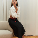 Celeste Cascade Skirt in 100% certified Como silk features an elasticated waistband and cascading hemline, offering refined elegance for day-to-night style.