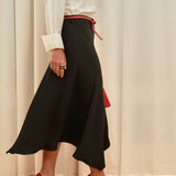 Celeste Cascade Skirt in 100% certified Como silk features an elasticated waistband and cascading hemline, offering refined elegance for day-to-night style.