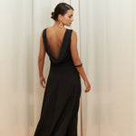 Audrey Serenity Gown in 100% certified Como silk features a round neckline and draped open back, offering timeless sophistication for formal occasions.