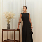 Audrey Serenity Gown in 100% certified Como silk features a round neckline and draped open back, offering timeless sophistication for formal occasions.
