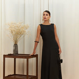 Audrey Serenity Gown in 100% certified Como silk features a round neckline and draped open back, offering timeless sophistication for formal occasions.