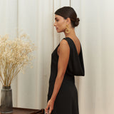 Audrey Serenity Gown in 100% certified Como silk features a round neckline and draped open back, offering timeless sophistication for formal occasions.