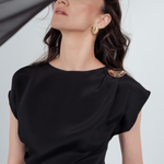 Gilded Mini Dress in 100% certified Como silk features a golden zamak accessory and asymmetrical draping—ideal for cocktail events and evening sophistication.