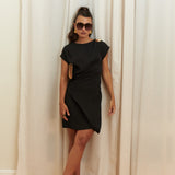 Gilded Mini Dress in 100% certified Como silk features a golden zamak accessory and asymmetrical draping—ideal for cocktail events and evening sophistication.