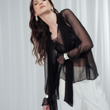 Noir Veil Blouse in 100% certified Como silk voile offers sheer elegance with voluminous sleeves and a delicate necktie—ideal for refined, modern styling.
