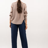 Bronze silk shirt – smooth back design, refined tailoring, and flowing 100% silk fabric for an effortlessly sophisticated look. Back view.