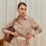 Bronze silk shirt – elegant high-neck, long-sleeve design in 100% silk with a luxurious sheen. Front view.