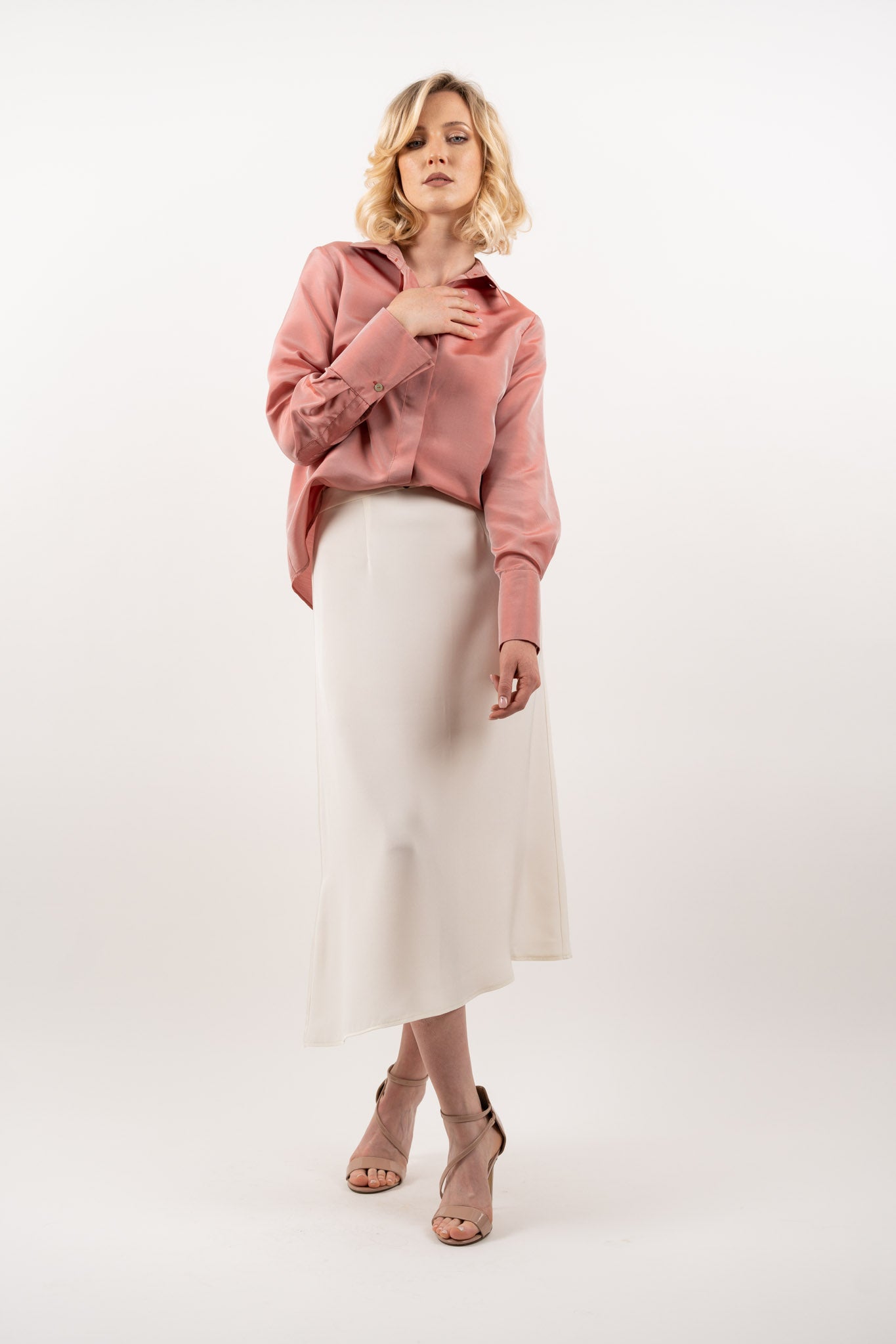 Ivory midi silk skirt – timeless high-waisted A-line skirt in 100% pure silk, designed for effortless elegance. Front view.