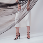 Ivory midi silk skirt – flowing A-line silhouette in 100% silk, flattering drape and graceful movement. Full Side view.