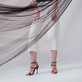Ivory midi silk skirt – flowing A-line silhouette in 100% silk, flattering drape and graceful movement. Full Side view.