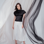 Ivory midi silk skirt – flowing A-line silhouette in 100% silk, flattering drape and graceful movement. Full Side view.