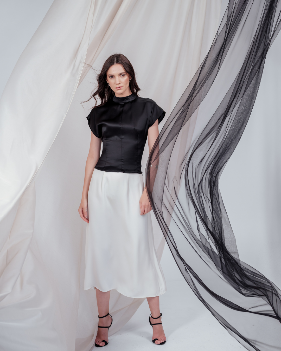 Ivory midi silk skirt – flowing A-line silhouette in 100% silk, flattering drape and graceful movement. Full Side view.