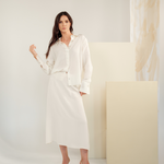 Ivory silk shirt – classic button-up design in 100% silk with an elegant drape and subtle sheen. Front view.