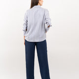 Striped silk shirt – refined back with a tailored fit, crafted in luxurious silk with classic navy and white stripes. Back view.