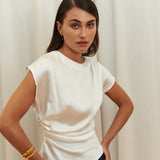 Pearl Draped Top in 100% certified Como silk offers minimalist elegance with delicate draping in white—ideal for versatile refined styling.