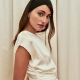 Pearl Draped Top in 100% certified Como silk offers minimalist elegance with delicate draping in white—ideal for versatile refined styling.